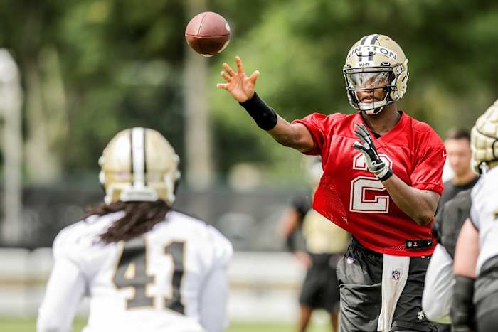 New Orleans Saints quarterback Jameis Winston (2) passes to running back Alvin Kamara (41) during training camp at Ochsner Sports Performance Center. Mandatory Credit: Stephen Lew-USA TODAY